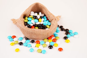 Sack bag of colorful chocolate stock image