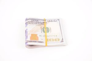 Bundle of bright dollars isolated